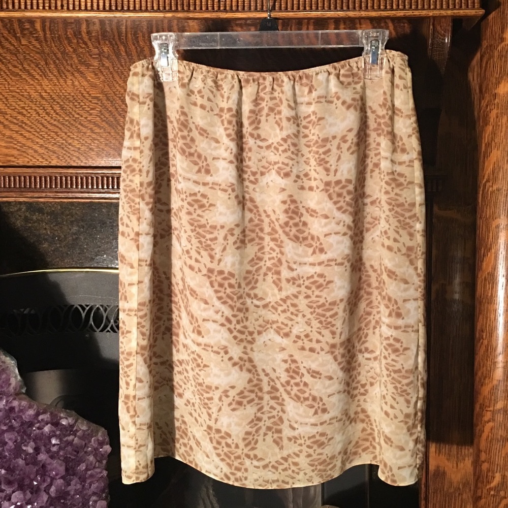 Knee length slip skirt in neutral tones